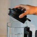 The JESE Heated Blender comes with a 48 Oz thick glass jar featuring clear measurement markings for accurate ingredient preparation. The spacious container is ideal for family-size smoothies, soups, and homemade recipes.