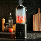 JESE 2-in-1 Heated Blender and Soup Maker, showcasing its compact countertop design and user-friendly control panel. Designed to heat and blend ingredients in one appliance for convenient everyday cooking.
